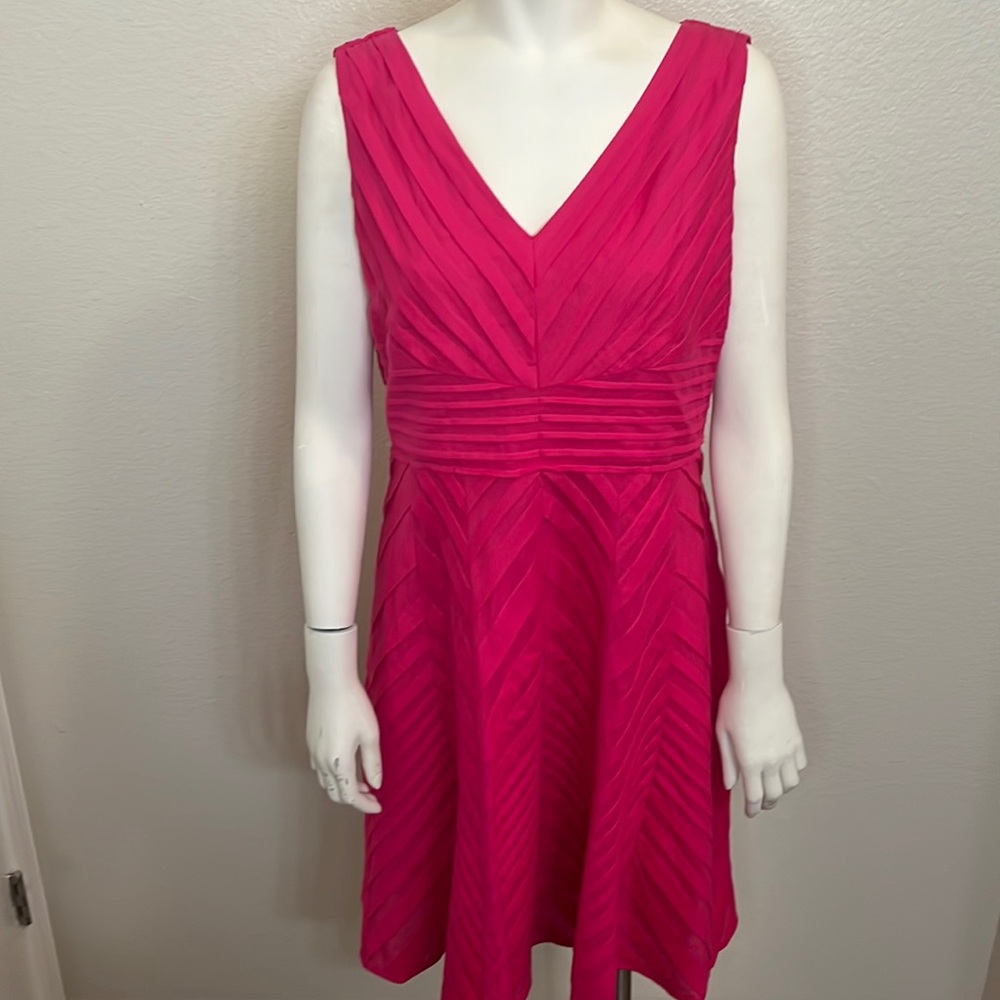Calvin Klein sleeveless mini/flowing/ruffles.